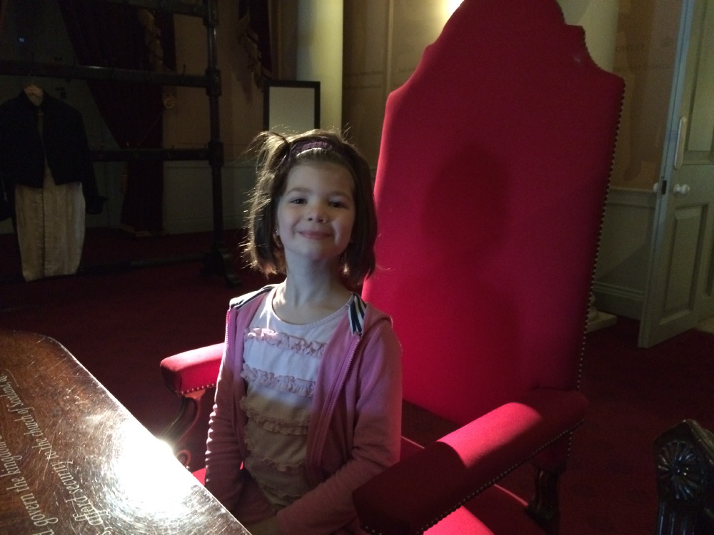 Rosie in Queen Victoria's chair.
