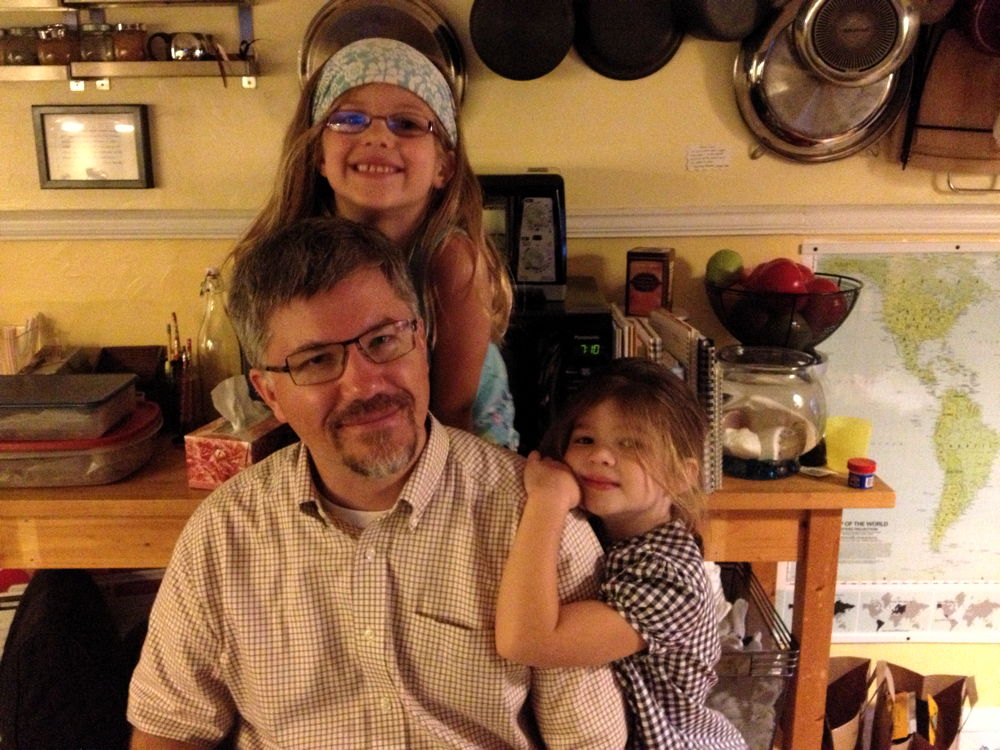Jon and his sweet daughters.